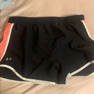 Under armor pink and black shorts size M